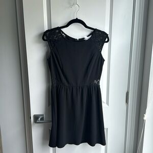 Specklers black dress with lace cutouts